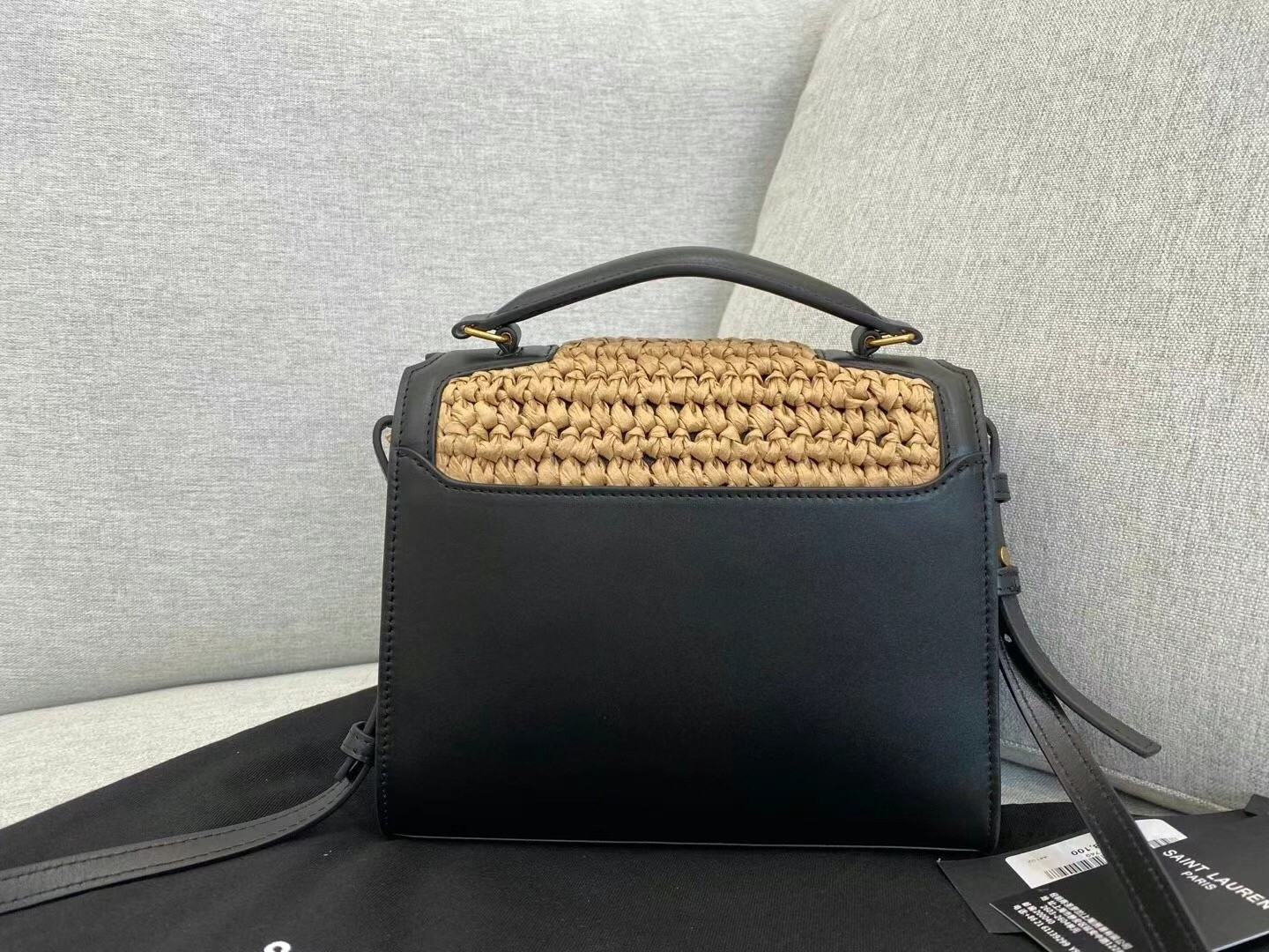 Sa**t Lau*nt cassandra mini top handle bag in raffia