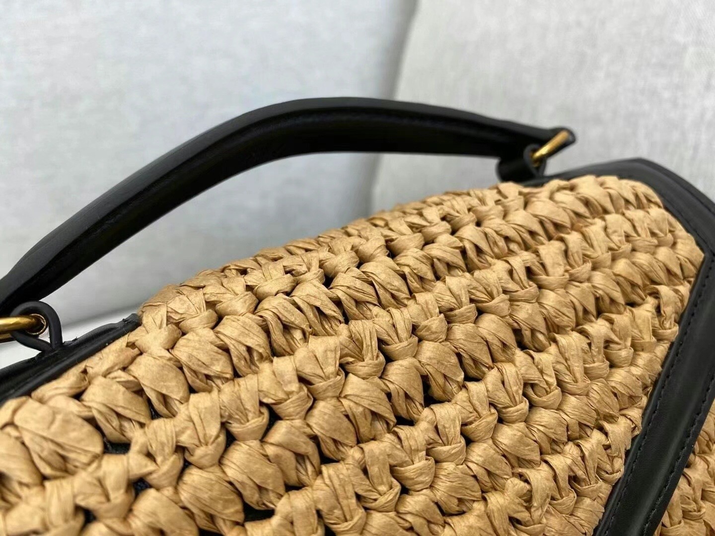 Sa**t Lau*nt cassandra mini top handle bag in raffia