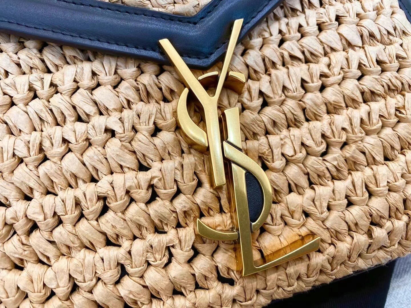 Sa**t Lau*nt cassandra mini top handle bag in raffia