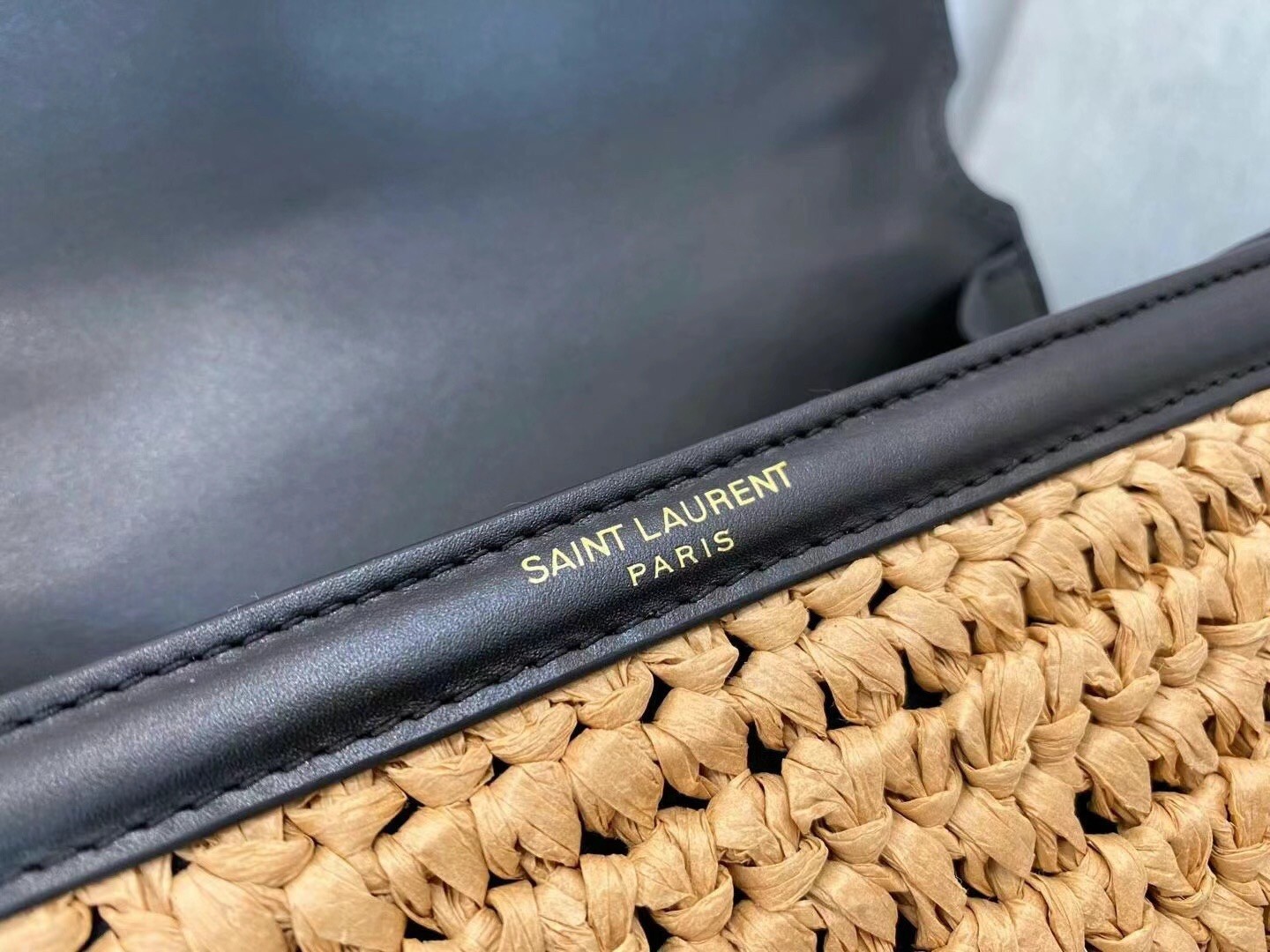 Sa**t Lau*nt cassandra mini top handle bag in raffia