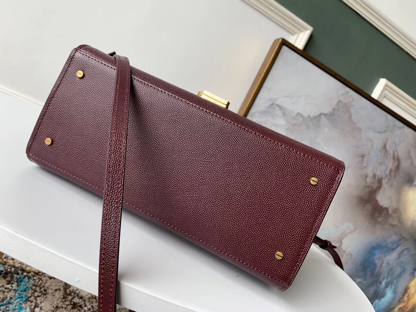 Sa**t Lau*nt cassandra medium bag in bordeaux grained leather