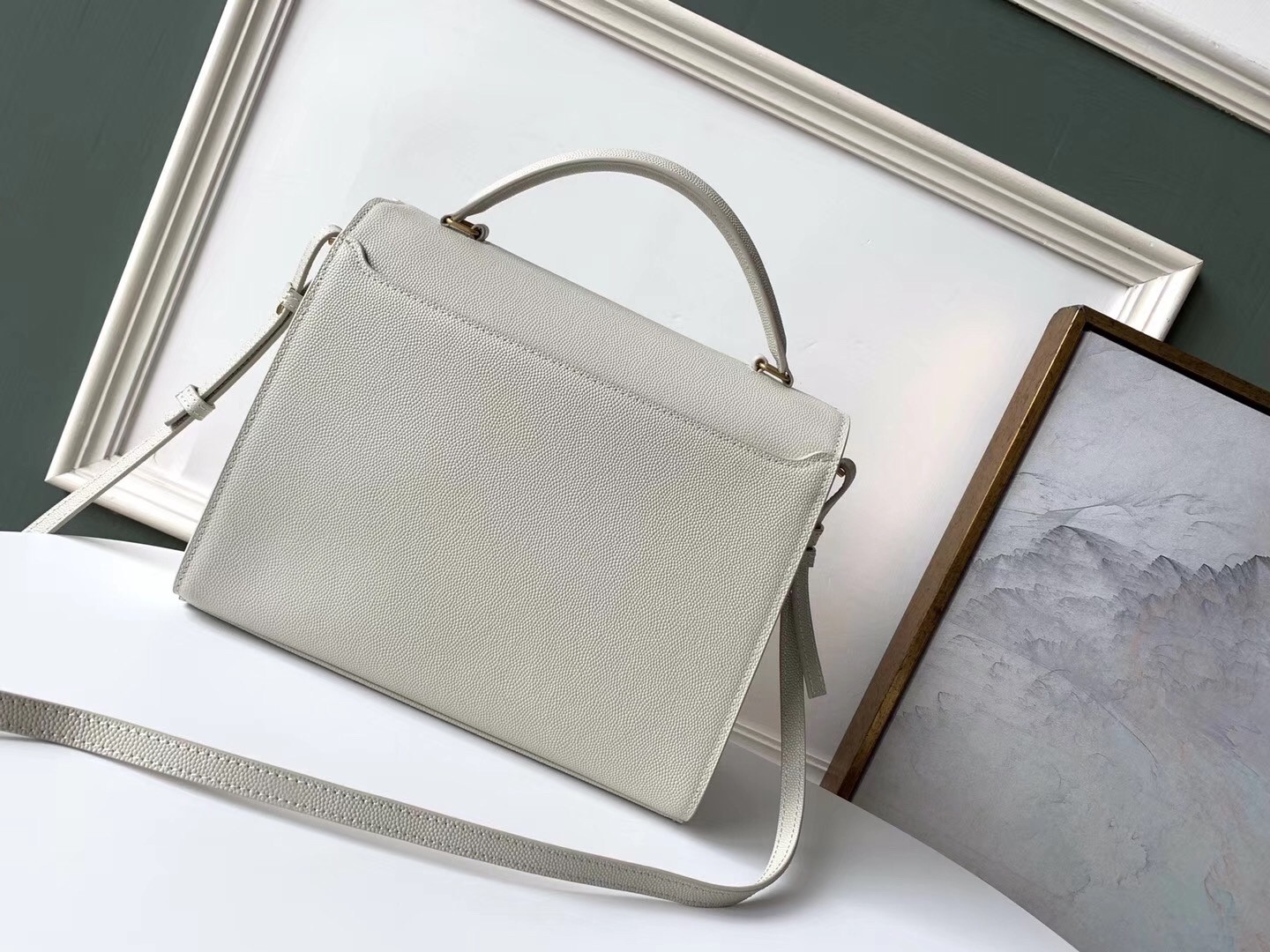 Sa**t Lau*nt cassandra medium bag in white grained leather