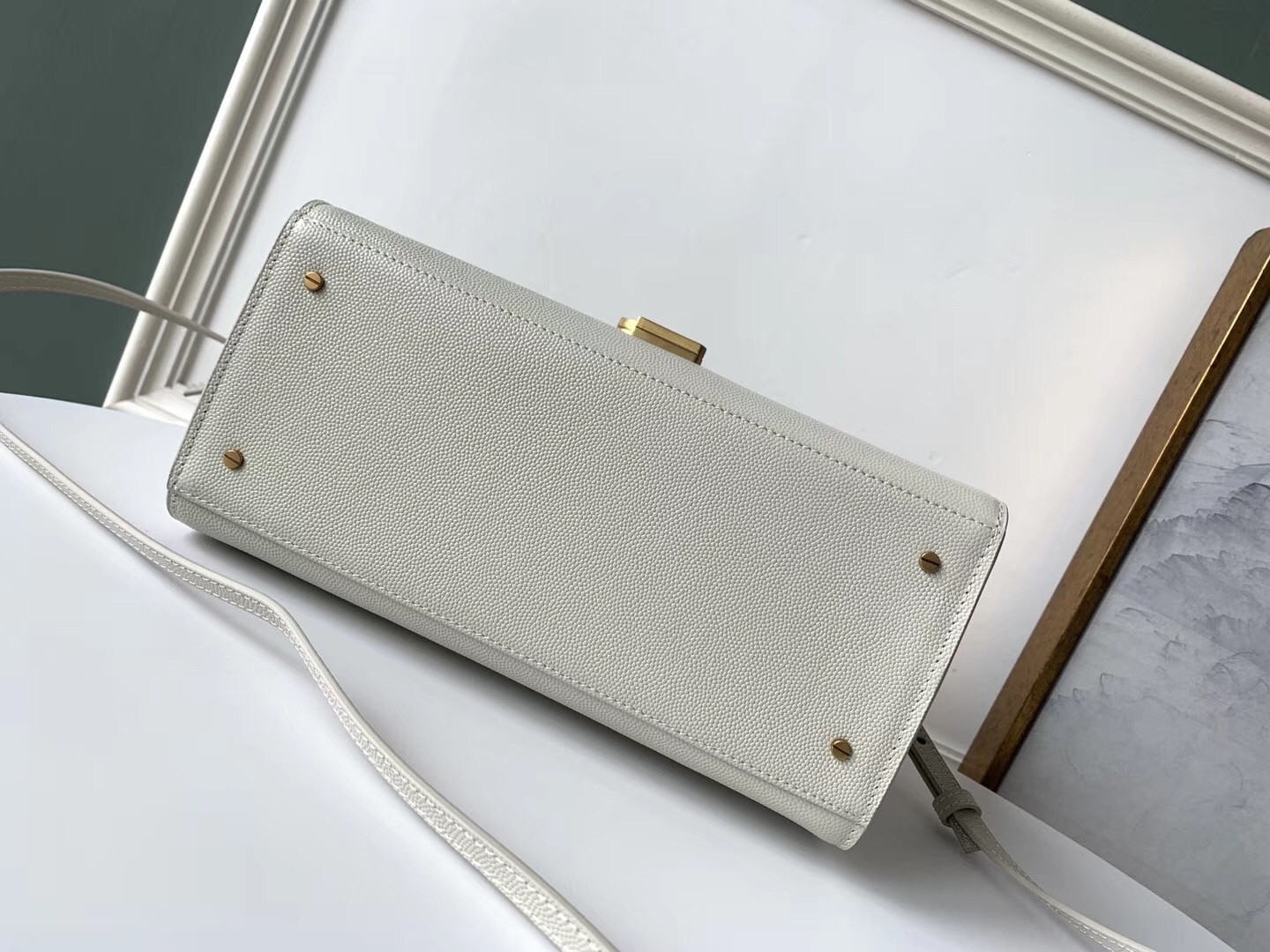 Sa**t Lau*nt cassandra medium bag in white grained leather