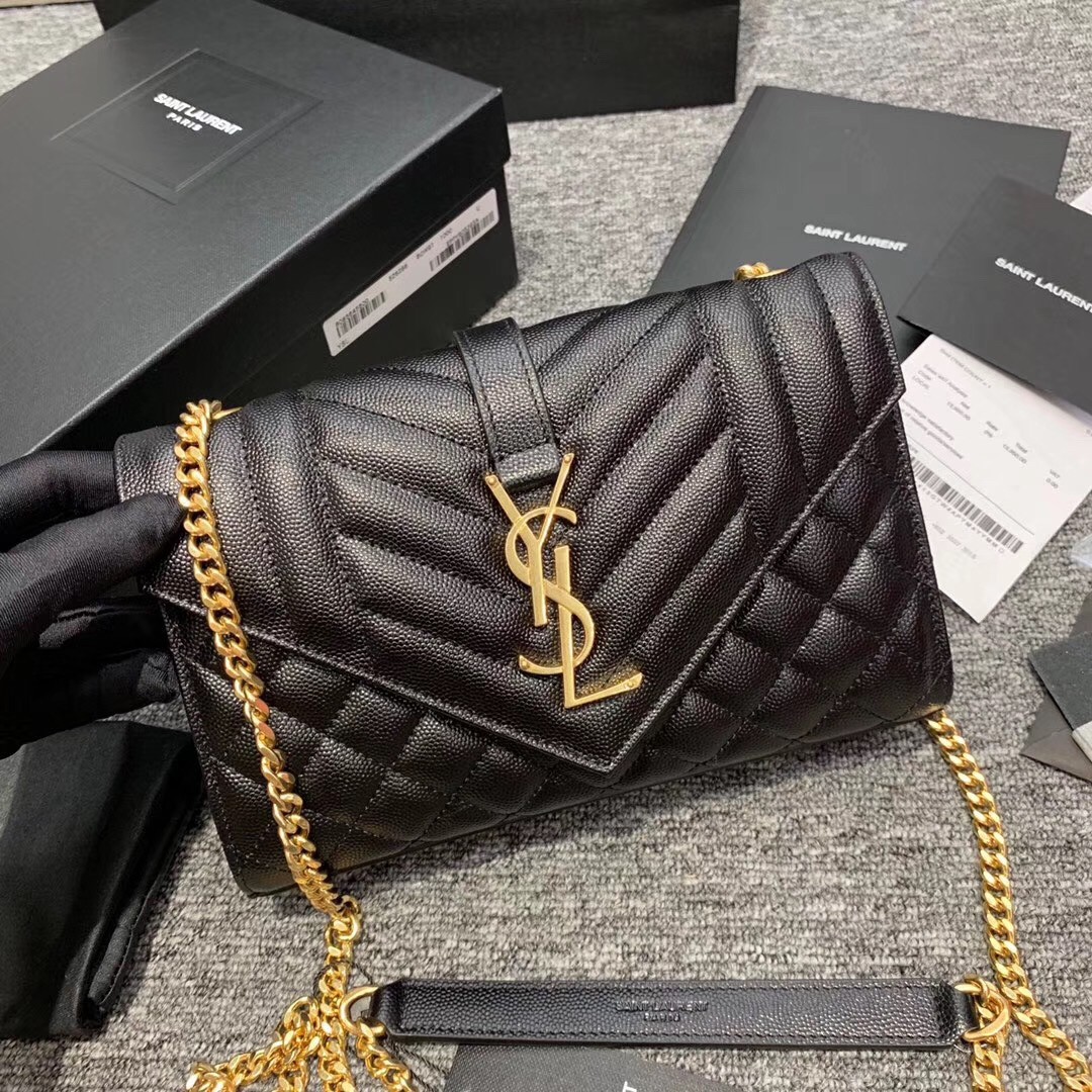 Sa**t Lau*nt small envelope bag in black grained leather