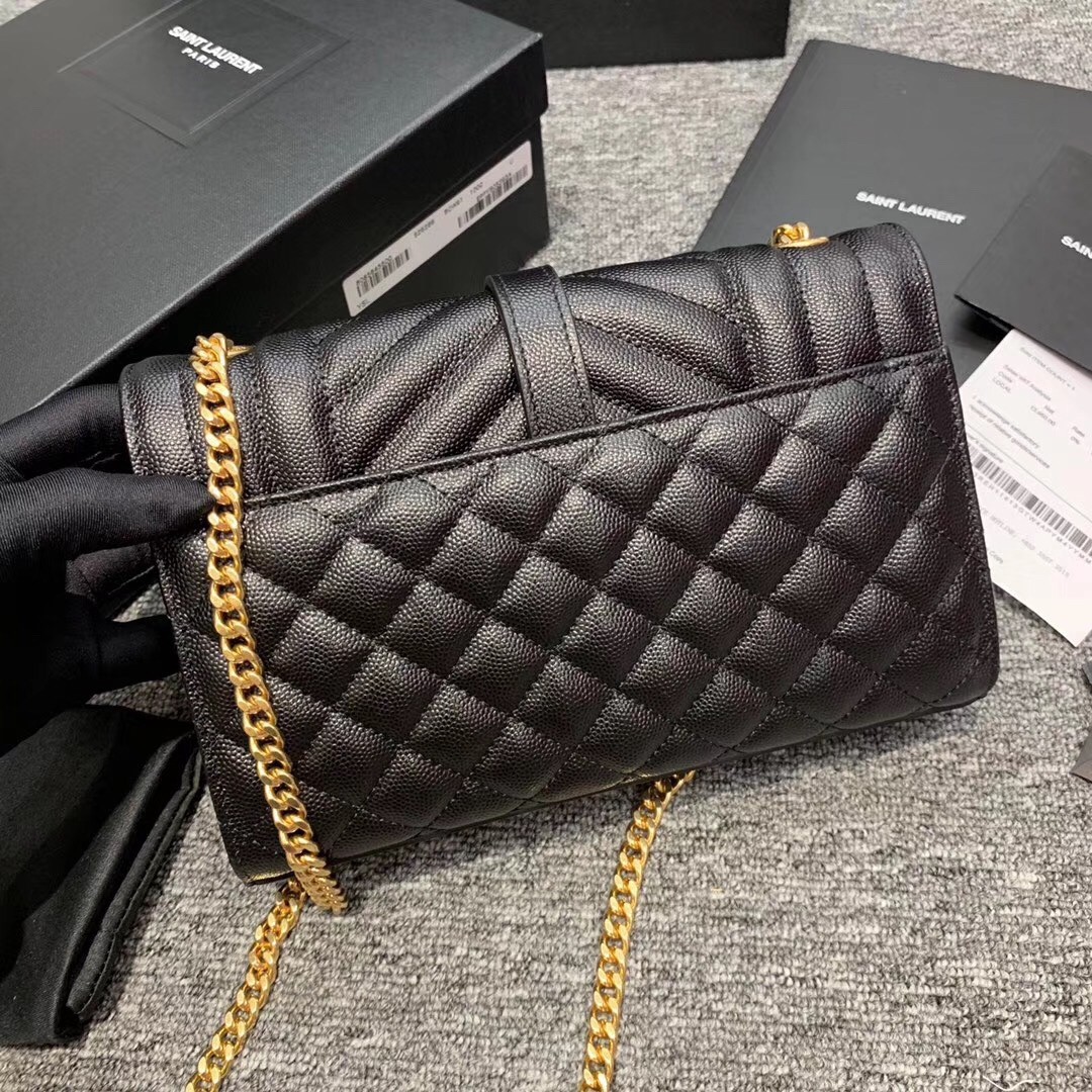 Sa**t Lau*nt small envelope bag in black grained leather