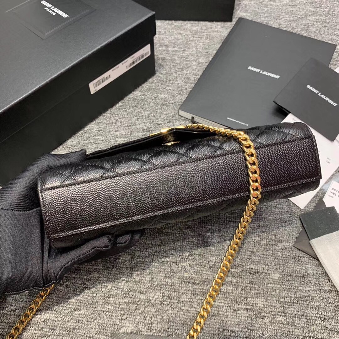 Sa**t Lau*nt small envelope bag in black grained leather