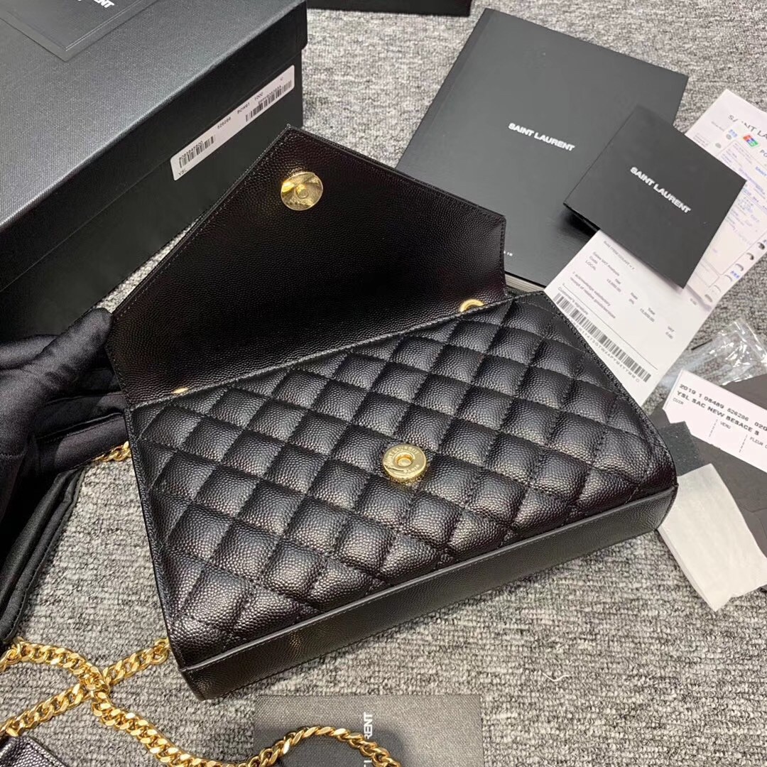 Sa**t Lau*nt small envelope bag in black grained leather