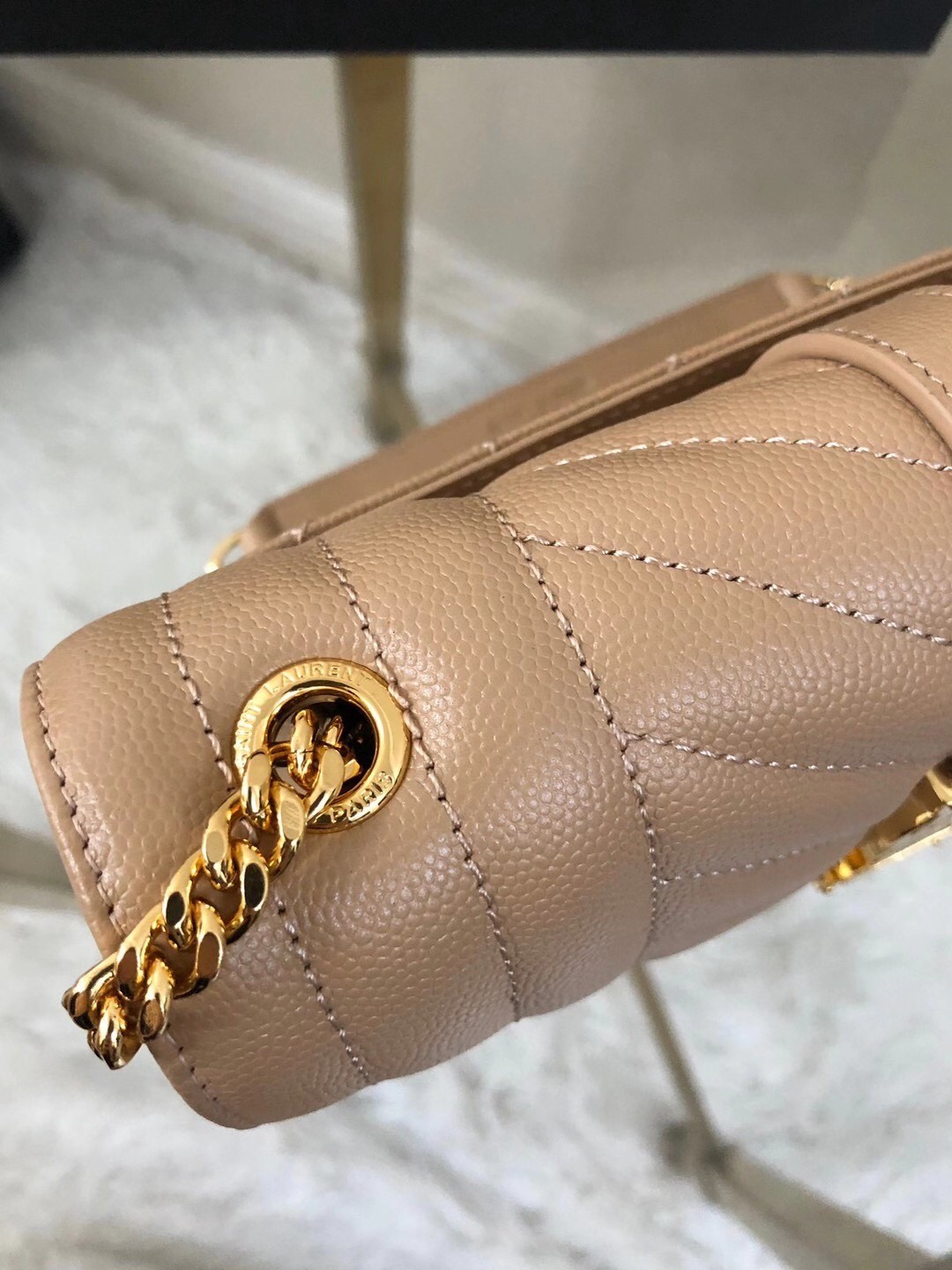 Sa**t Lau*nt small envelope bag in beige grained leather