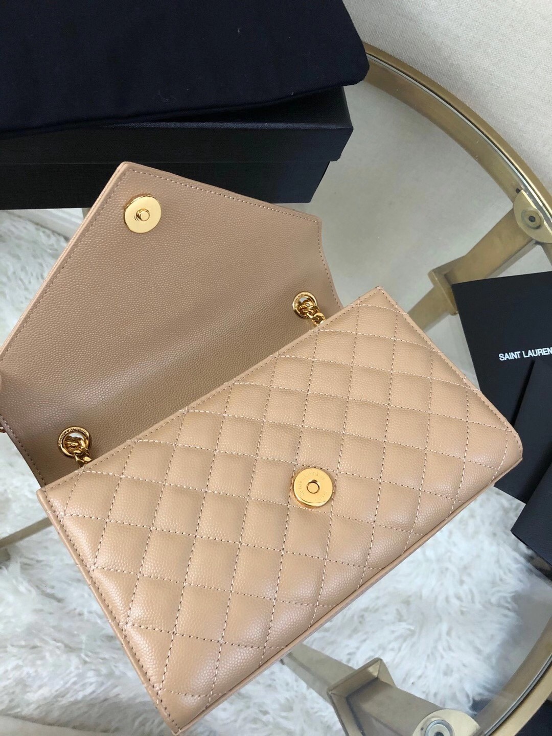 Sa**t Lau*nt small envelope bag in beige grained leather