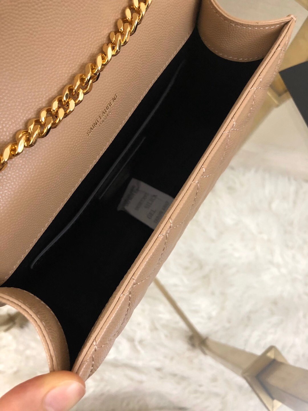 Sa**t Lau*nt small envelope bag in beige grained leather