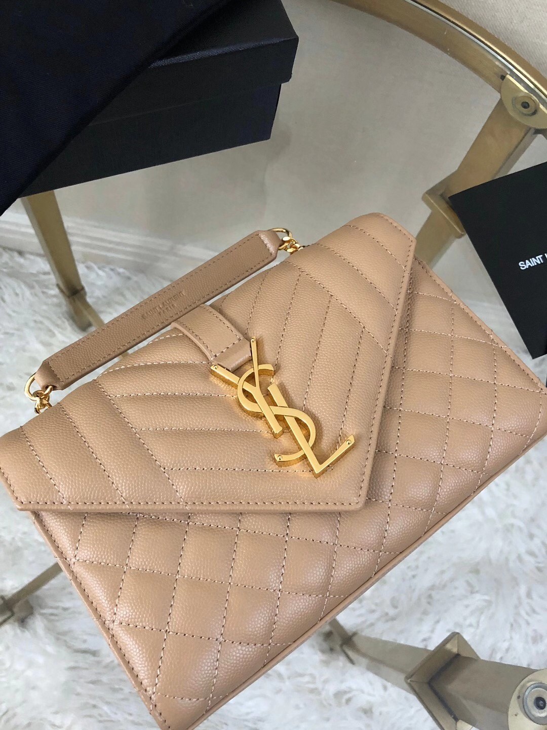 Sa**t Lau*nt small envelope bag in beige grained leather