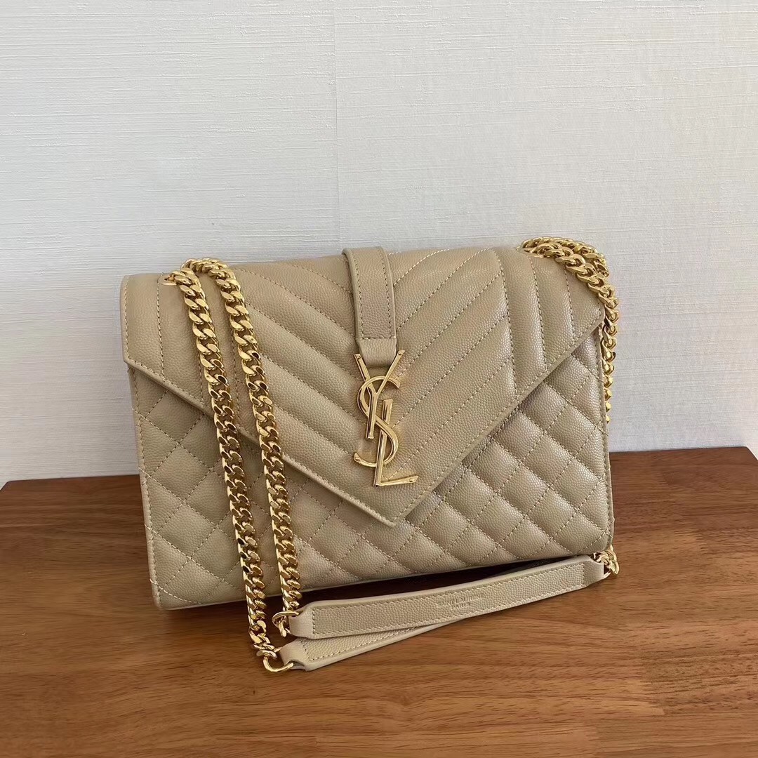 Sa**t Lau*nt medium envelope bag in beige grained leather