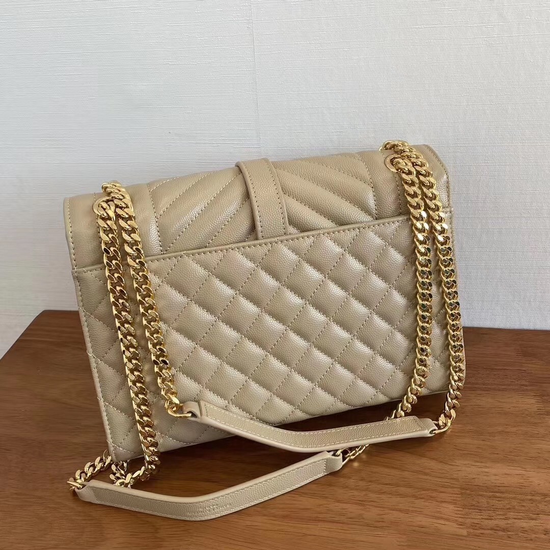 Sa**t Lau*nt medium envelope bag in beige grained leather