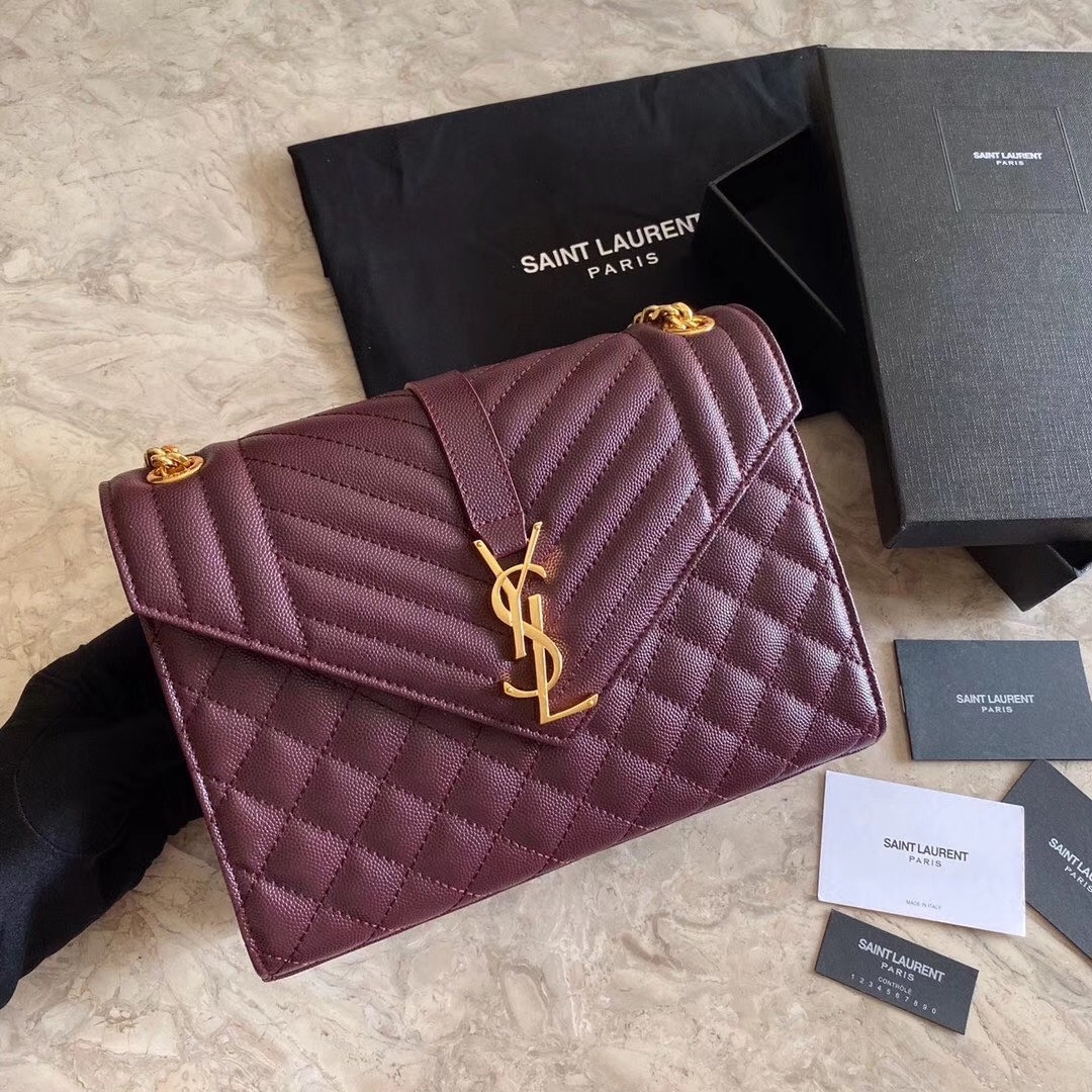 Sa**t Lau*nt medium envelope bag in bordeaux grained leather