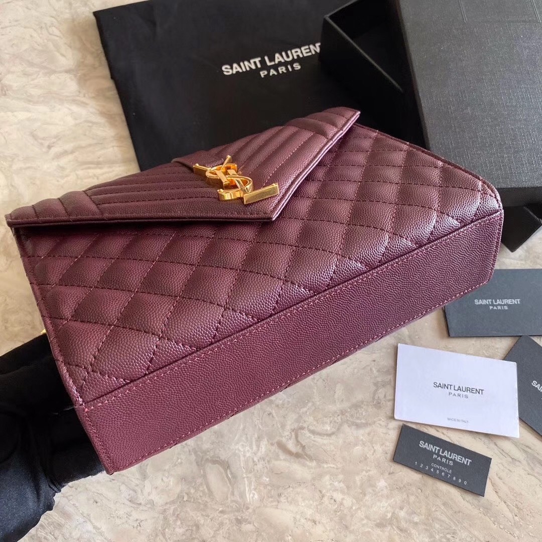 Sa**t Lau*nt medium envelope bag in bordeaux grained leather