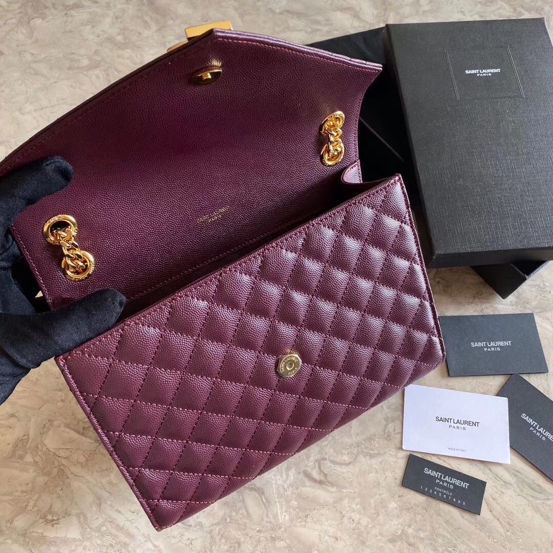 Sa**t Lau*nt medium envelope bag in bordeaux grained leather