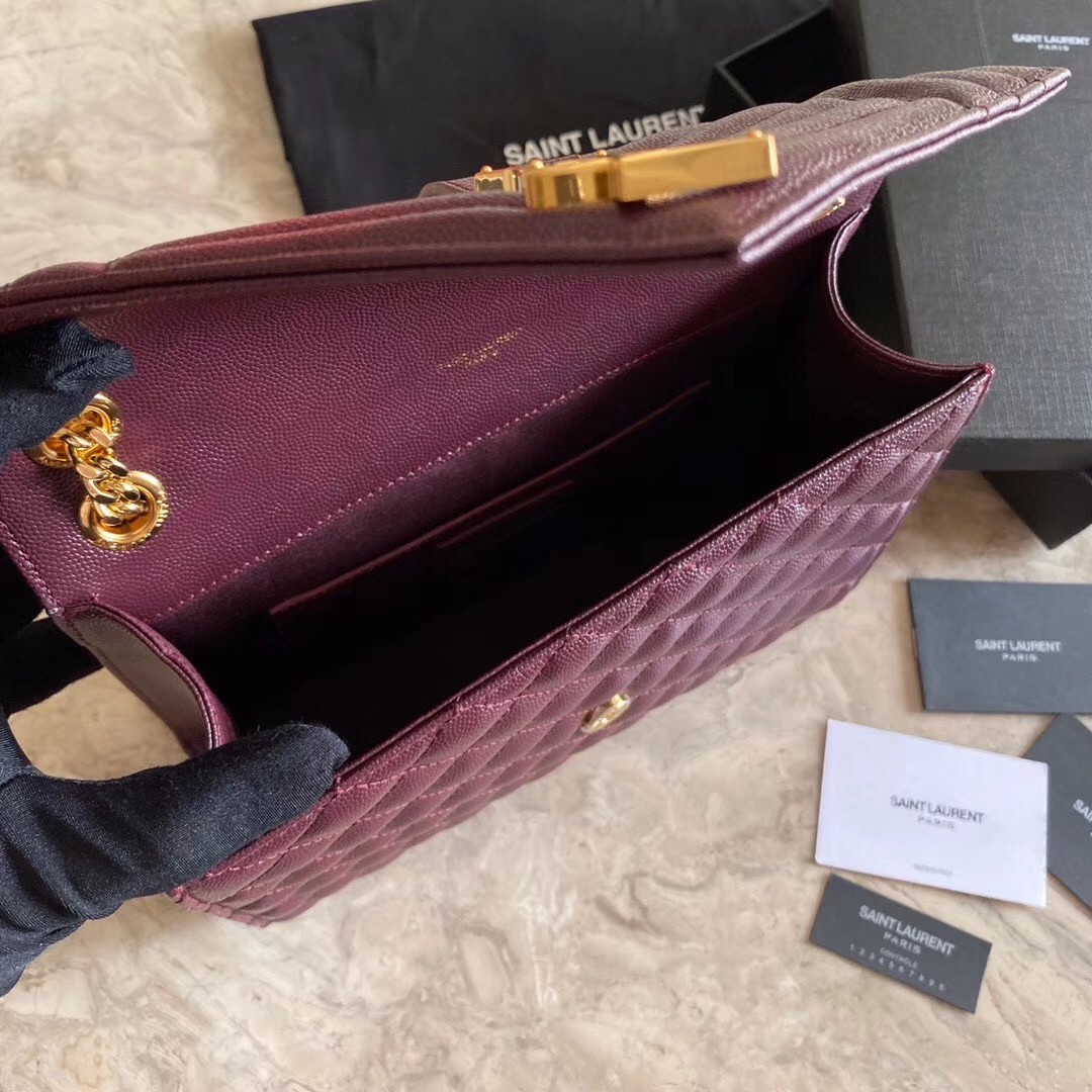 Sa**t Lau*nt medium envelope bag in bordeaux grained leather