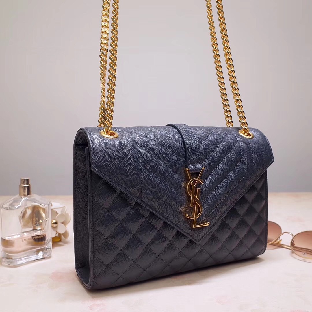 Sa**t Lau*nt medium envelope bag in navy blue grained leather