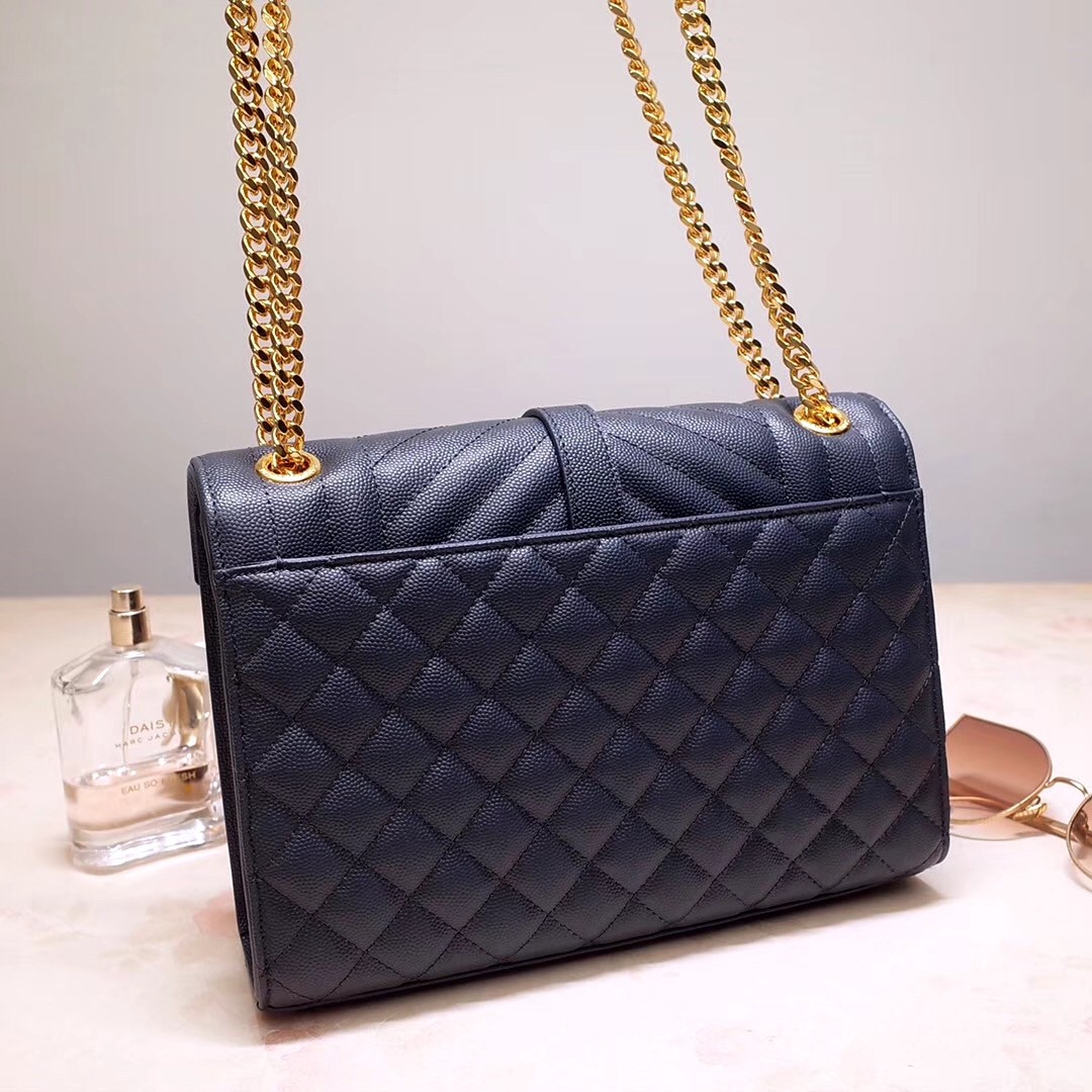 Sa**t Lau*nt medium envelope bag in navy blue grained leather