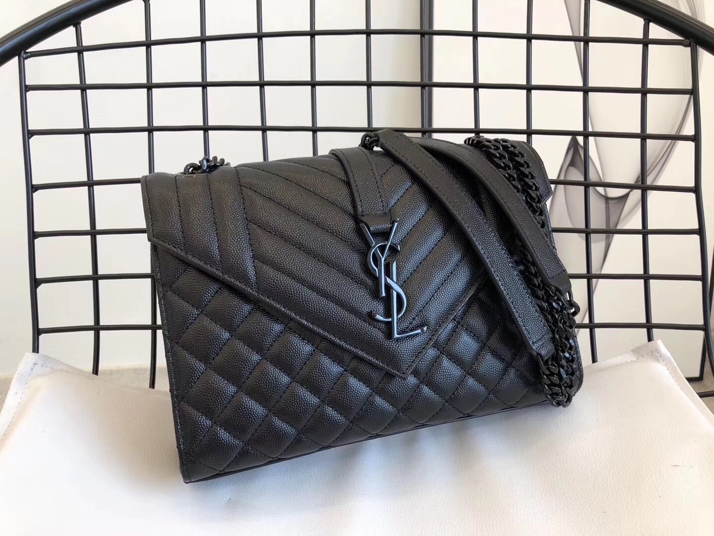 Sa**t Lau*nt medium envelope all black bag