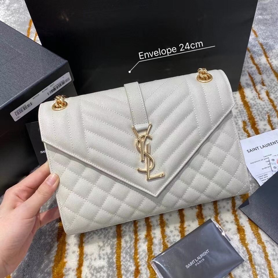 Sa**t Lau*nt medium envelope bag in white grained leather
