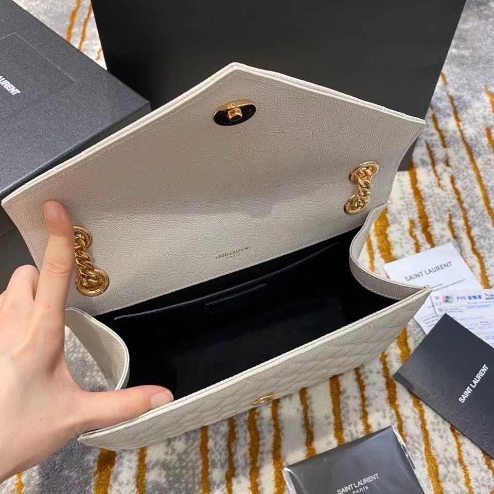 Sa**t Lau*nt medium envelope bag in white grained leather
