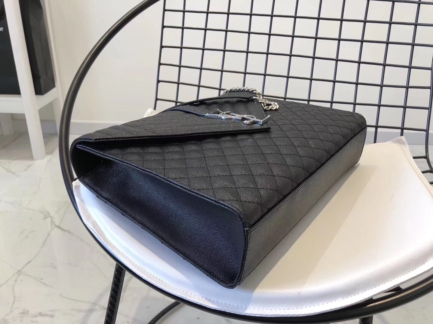 Sa**t Lau*nt envelope large bag in noir grained leather