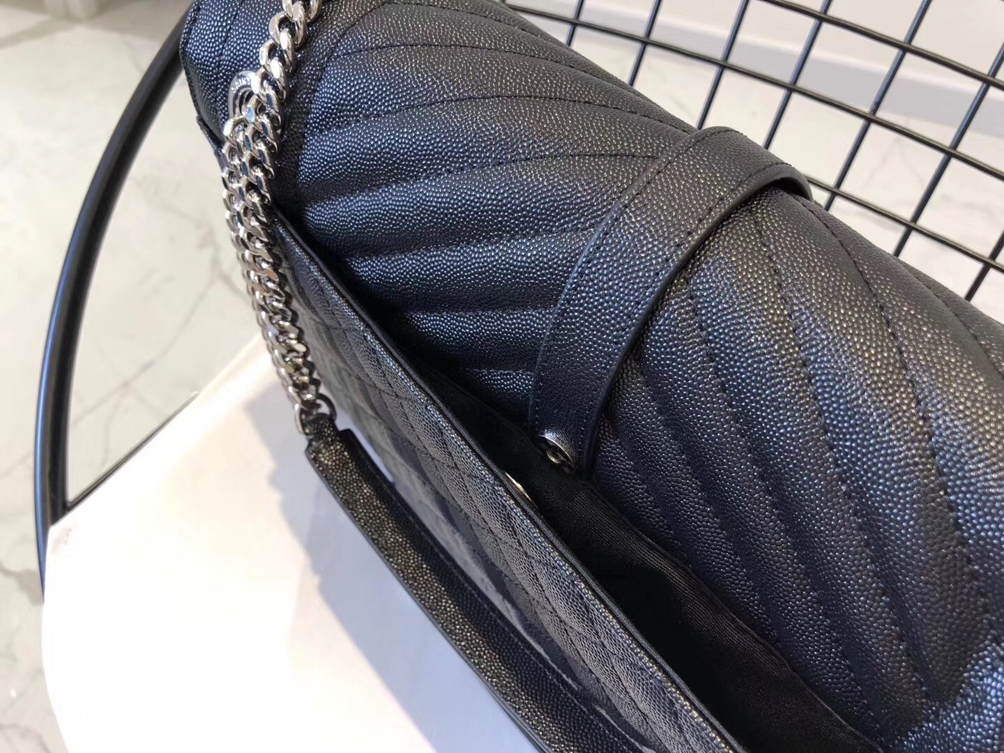 Sa**t Lau*nt envelope large bag in noir grained leather