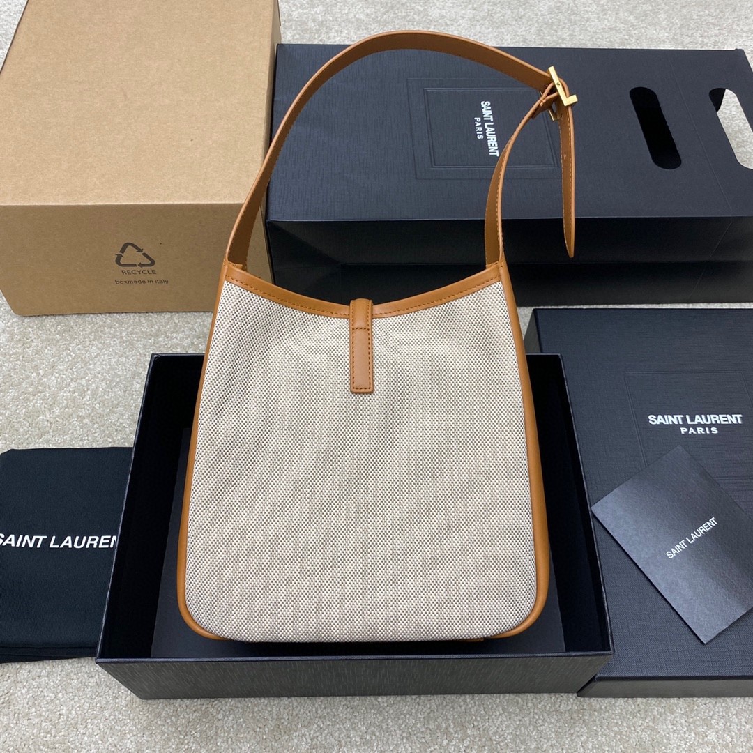 Sa**t Lau*nt le 5 À 7 small shoulder bag in canvas and leather