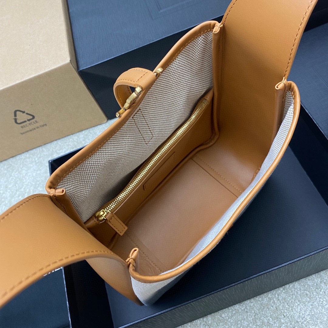 Sa**t Lau*nt le 5 À 7 small shoulder bag in canvas and leather