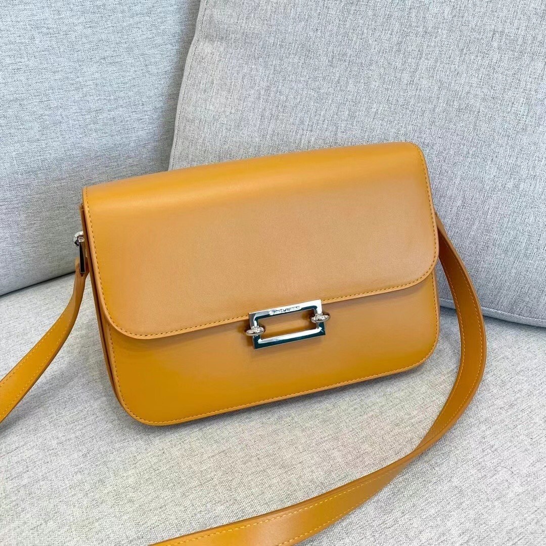 Sa**t Lau*nt le pave bag in saffron calfskin