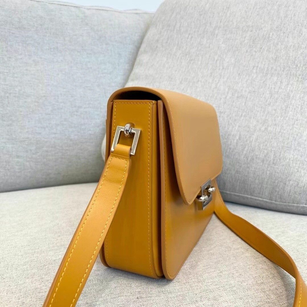 Sa**t Lau*nt le pave bag in saffron calfskin