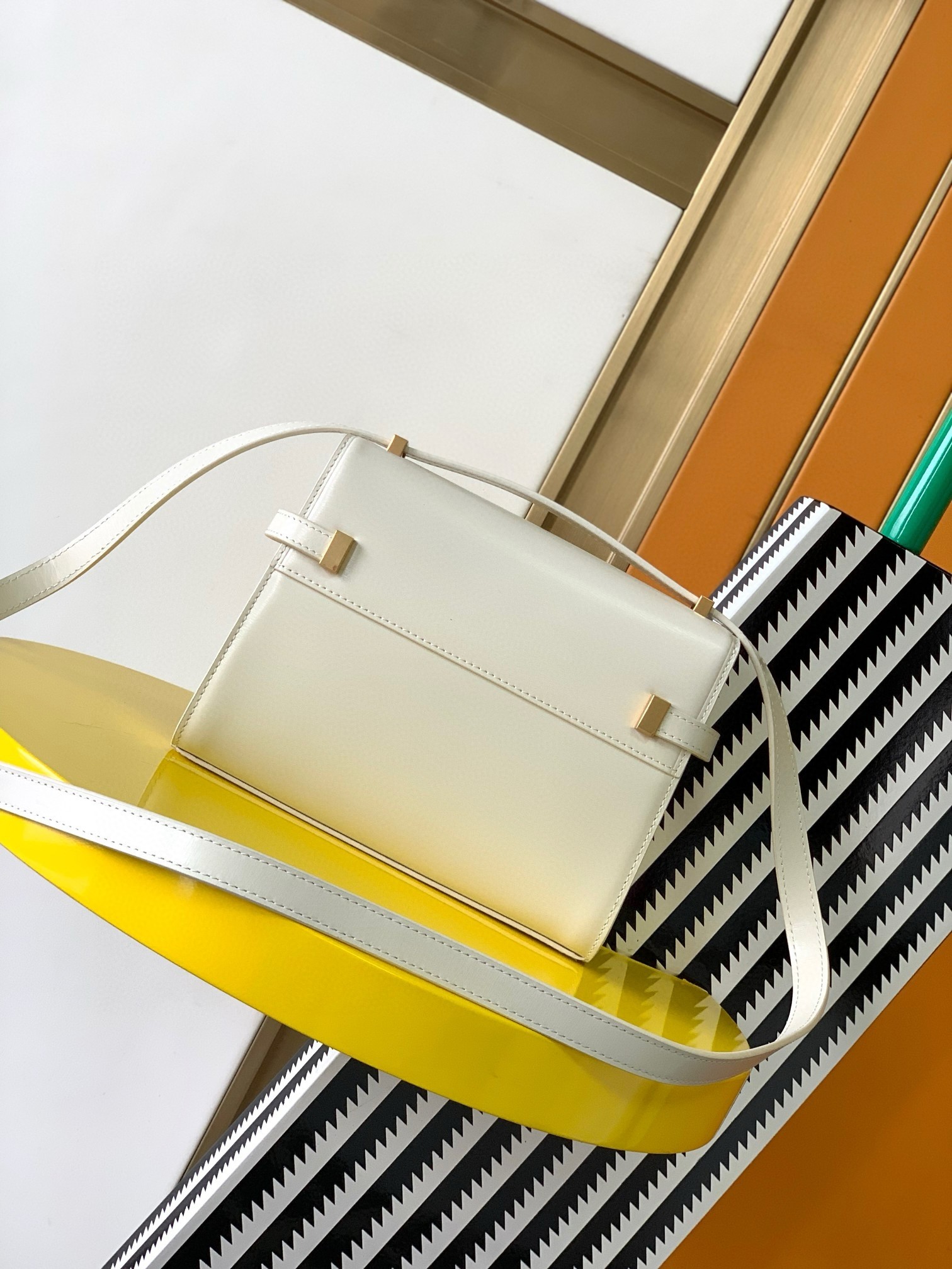 Sa**t Lau*nt manhattan mini shoulder bag in white calfskin