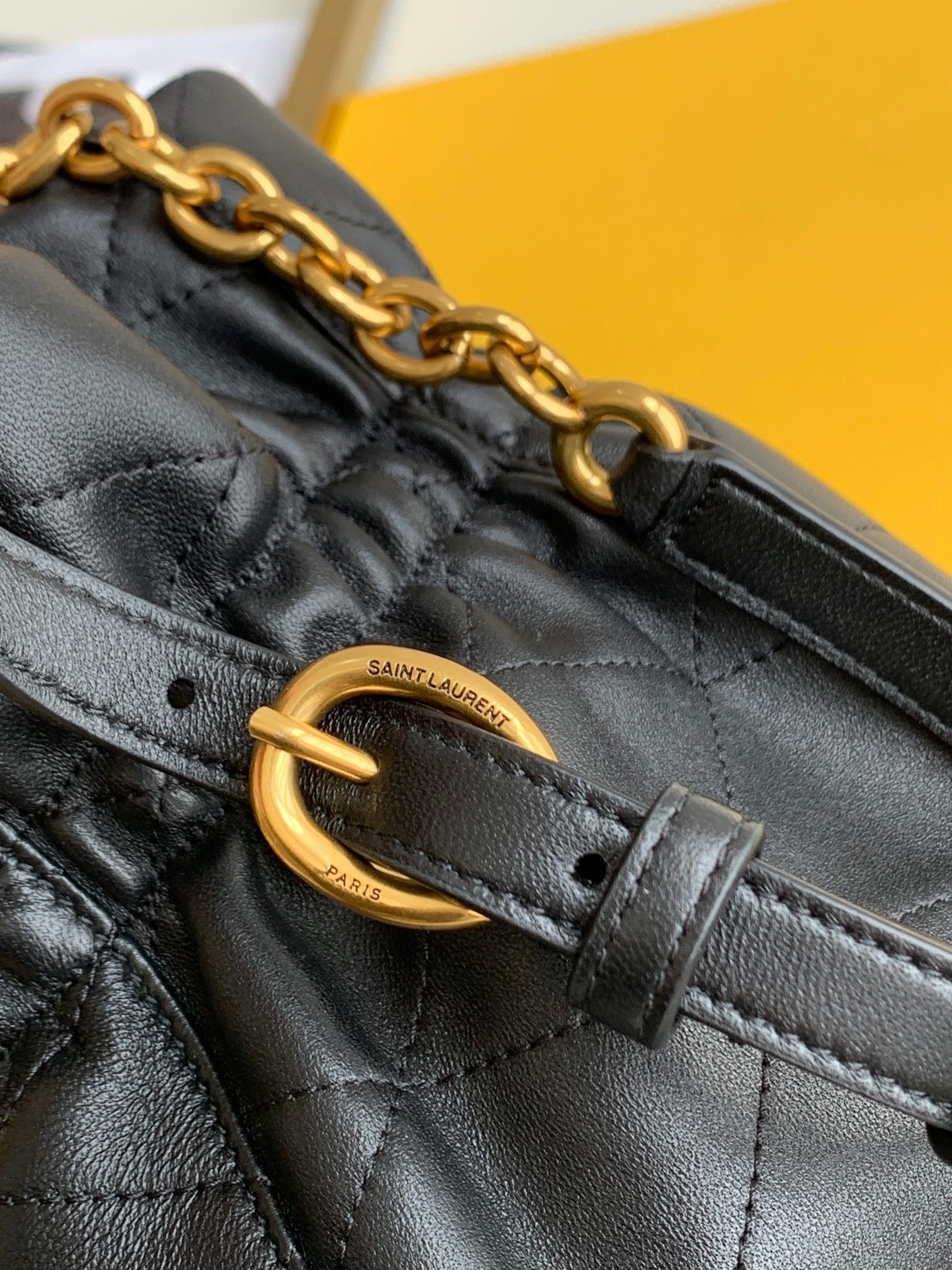 Sa**t Lau*nt le maillon hook bucket bag in black lambskin