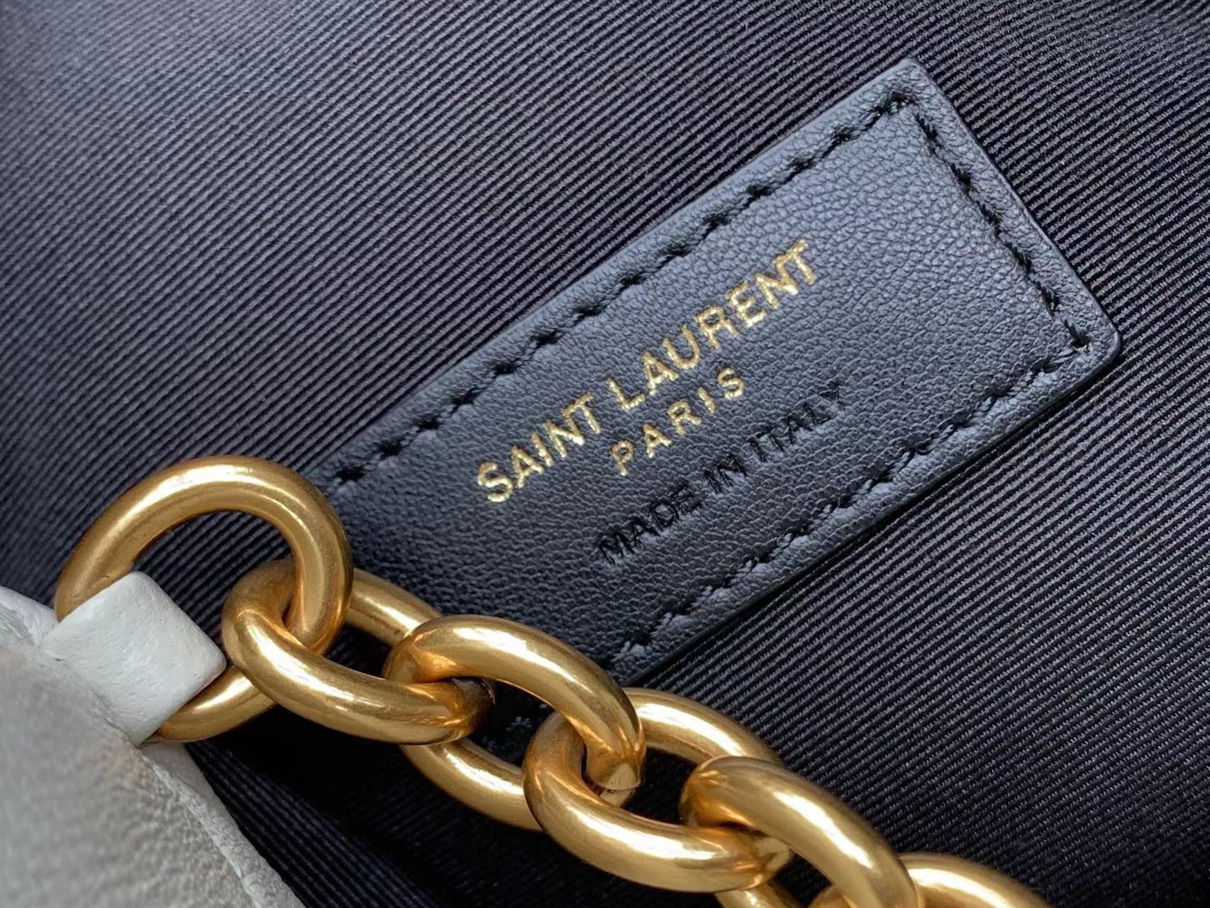 Sa**t Lau*nt le maillon hook bucket bag in white lambskin