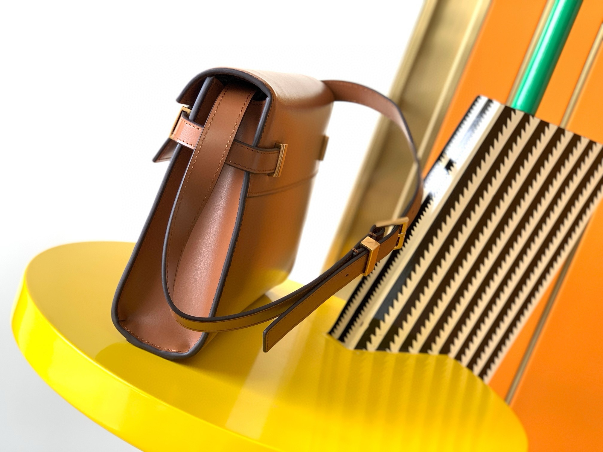 Sa**t Lau*nt manhattan small shoulder bag in brown calfskin