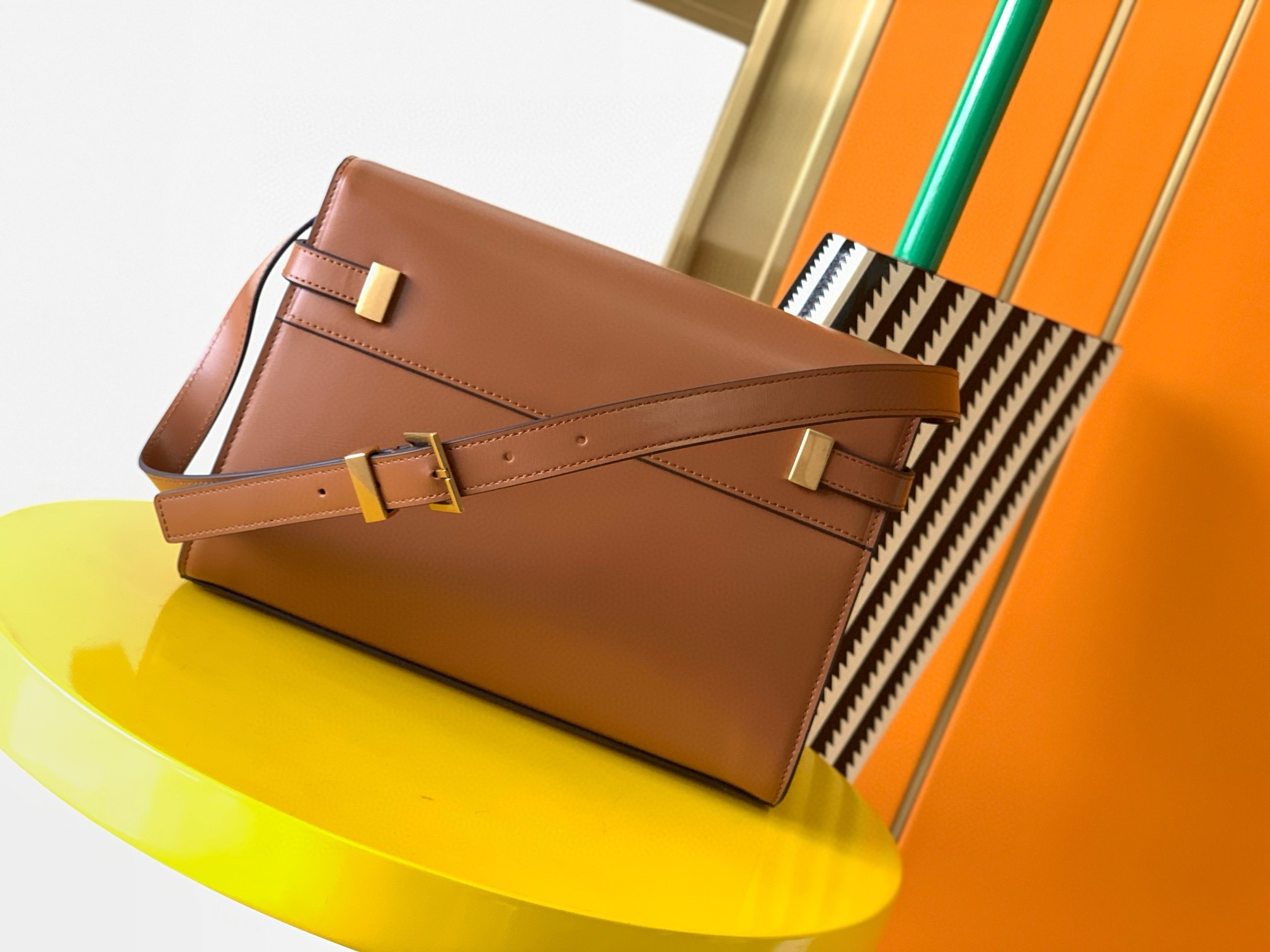 Sa**t Lau*nt manhattan small shoulder bag in brown calfskin
