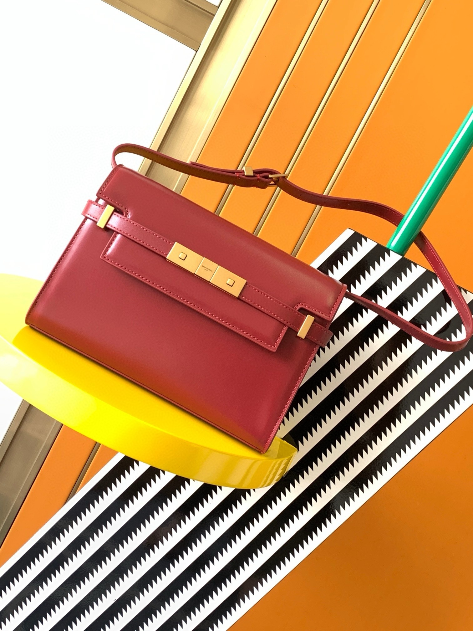Sa**t Lau*nt manhattan small shoulder bag in red calfskin