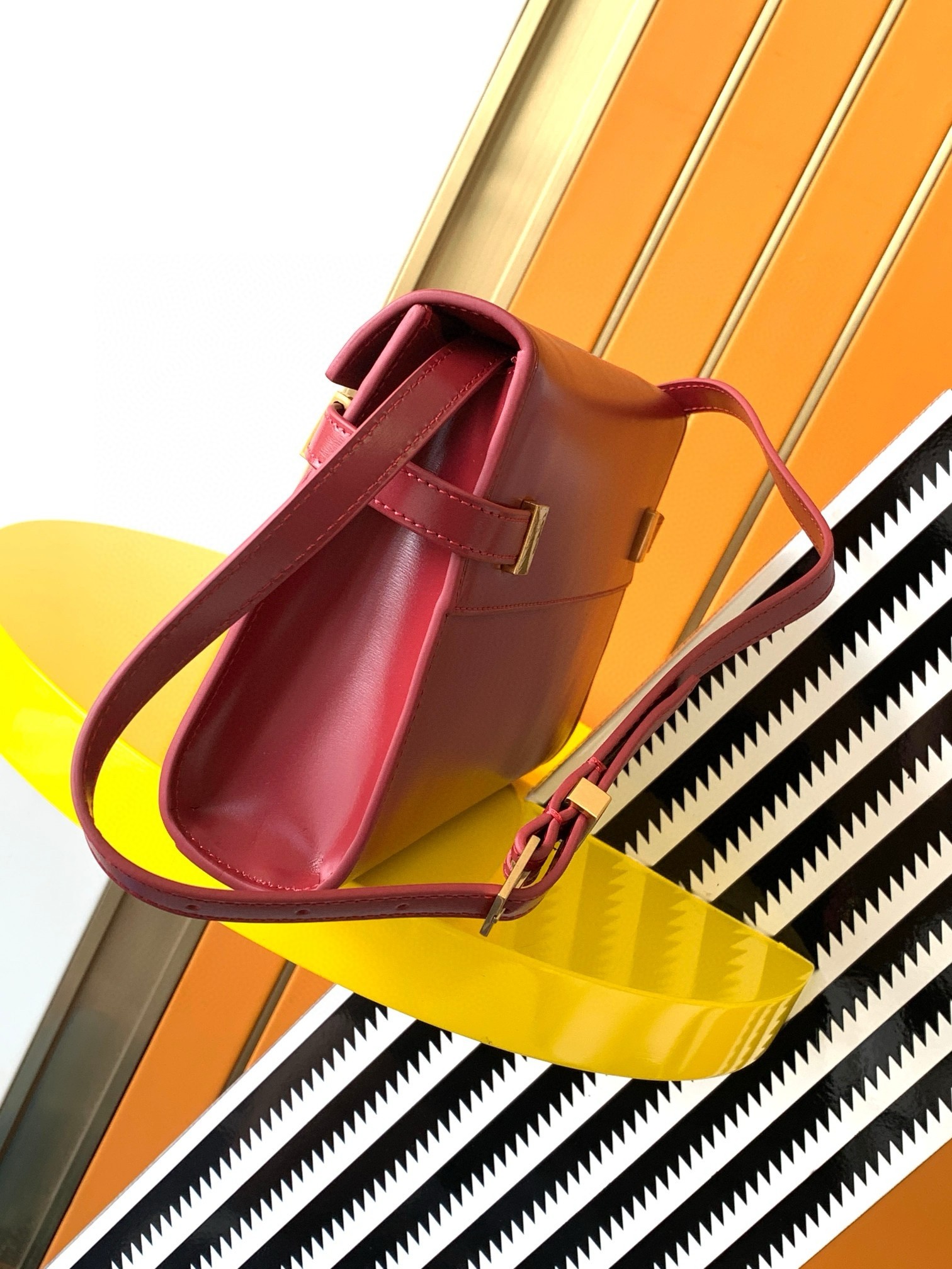 Sa**t Lau*nt manhattan small shoulder bag in red calfskin