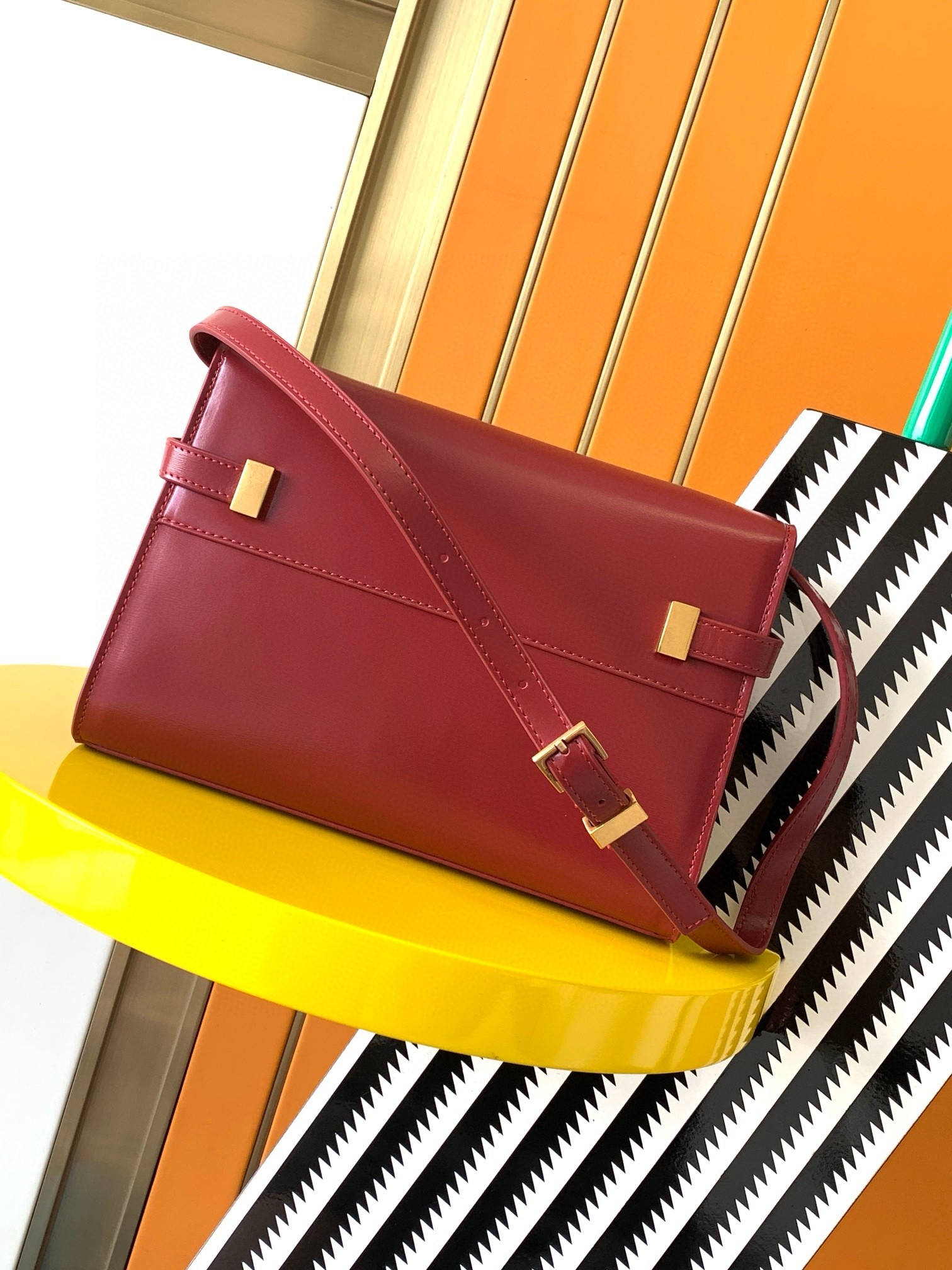 Sa**t Lau*nt manhattan small shoulder bag in red calfskin