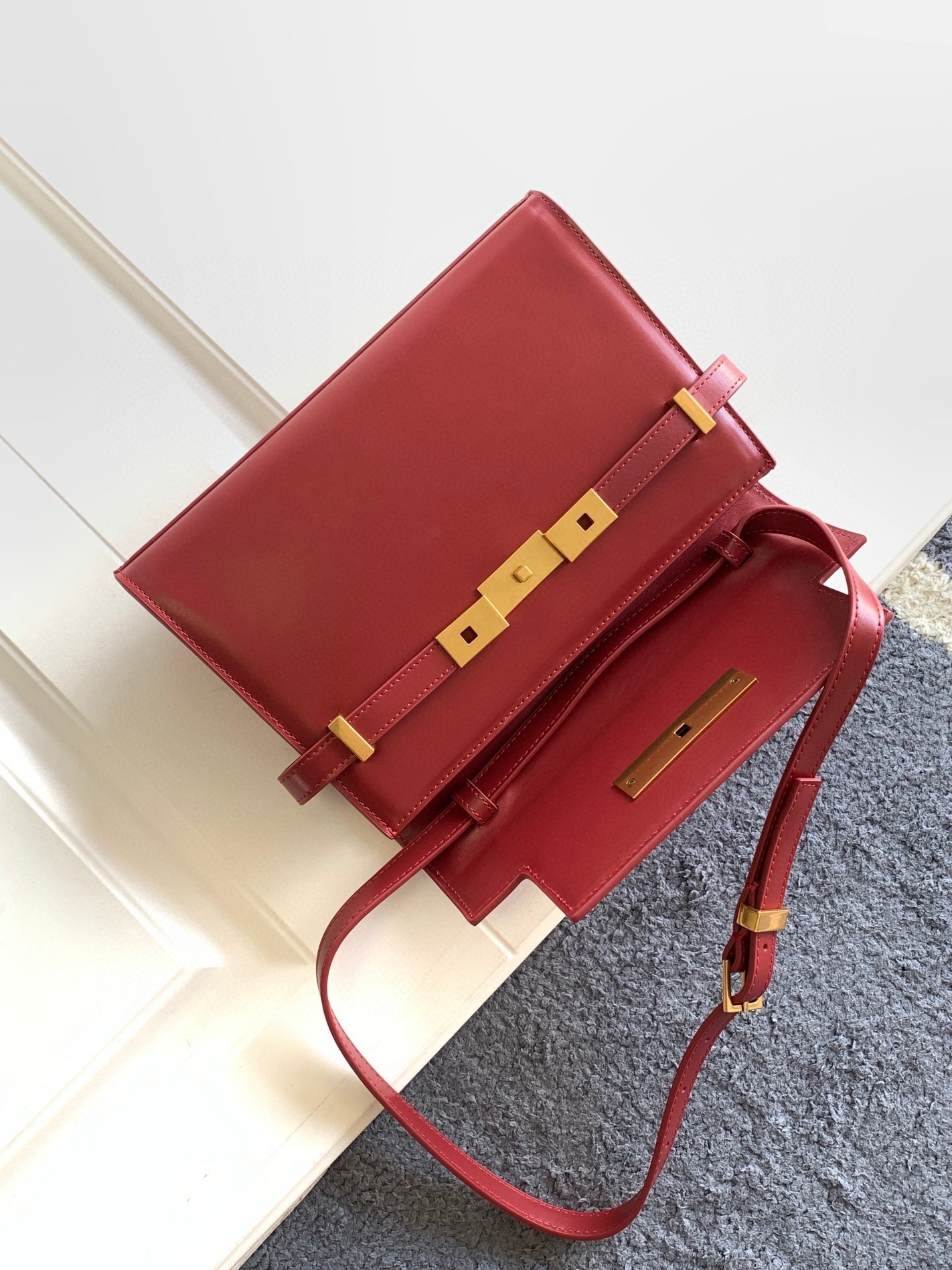 Sa**t Lau*nt manhattan small shoulder bag in red calfskin