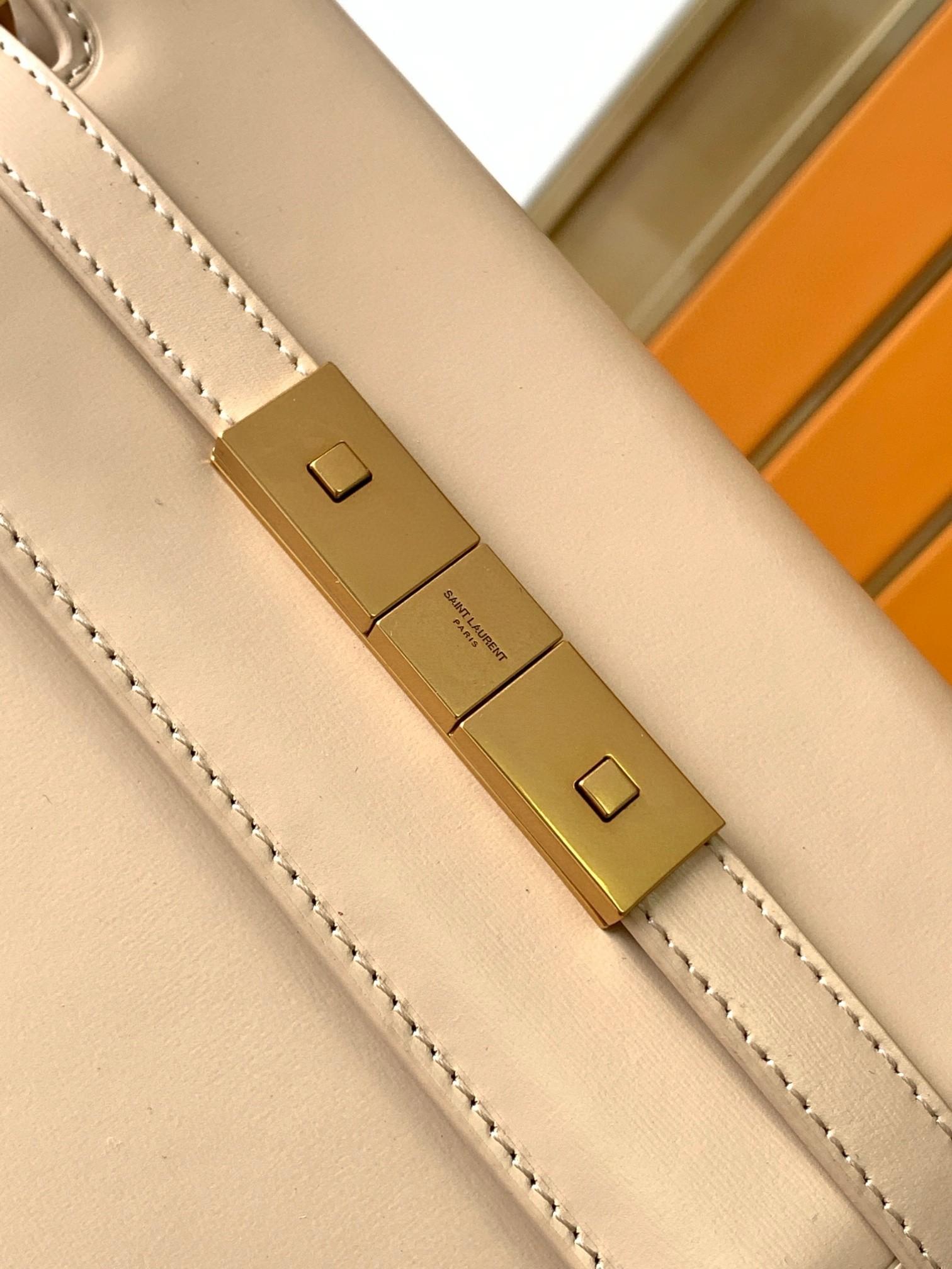 Sa**t Lau*nt manhattan small shoulder bag in beige calfskin