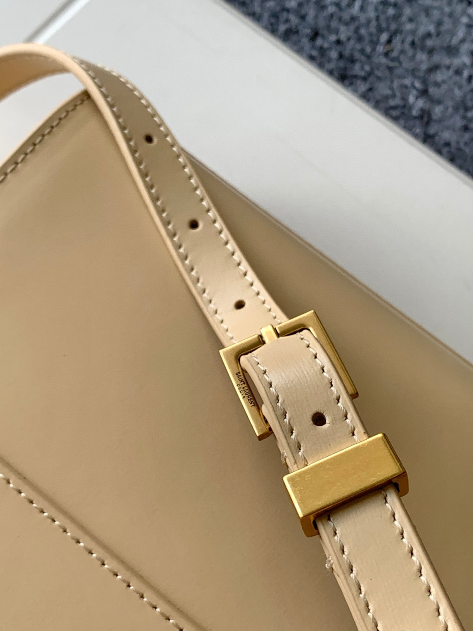 Sa**t Lau*nt manhattan small shoulder bag in beige calfskin