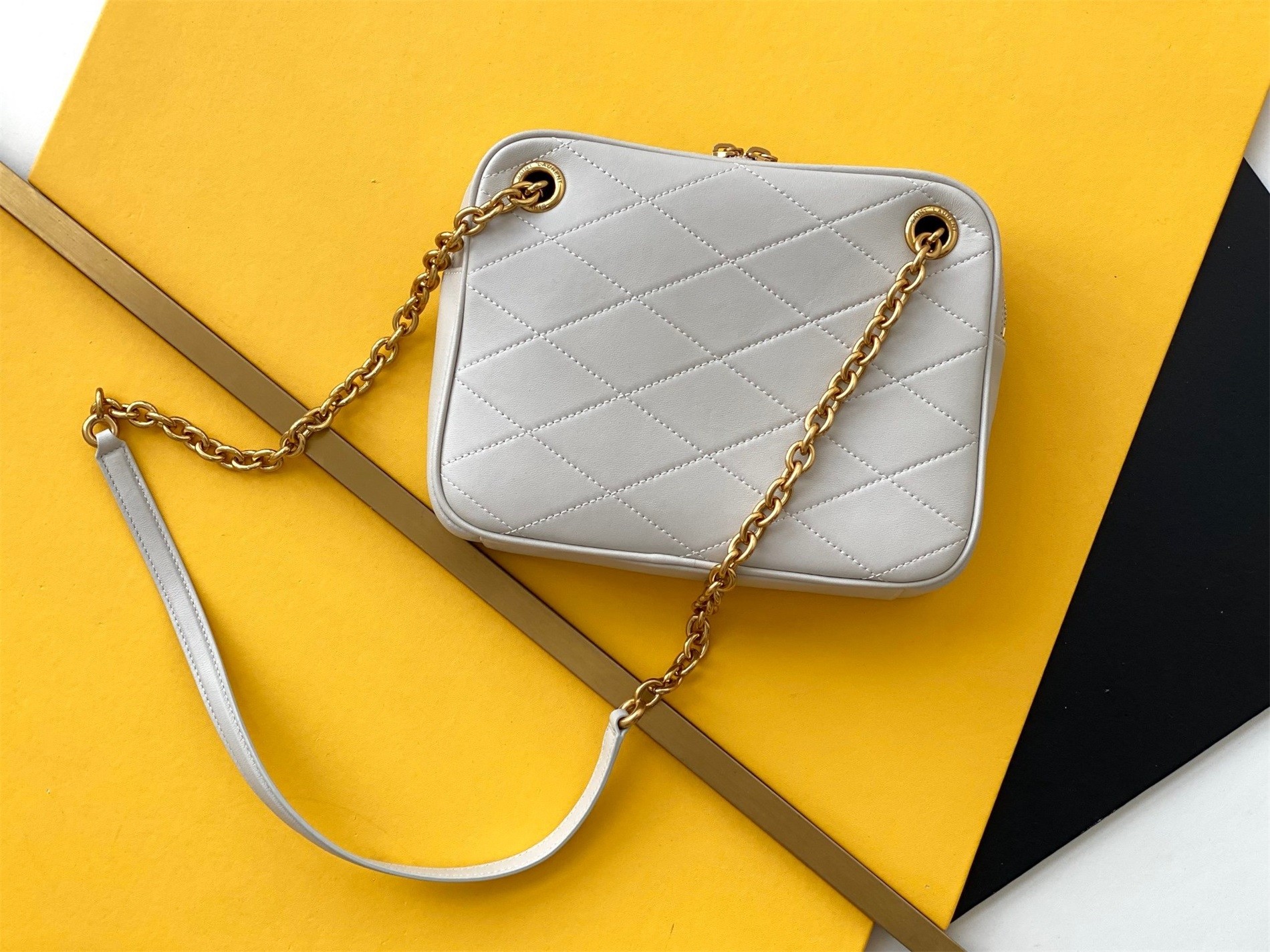 Sa**t Lau*nt le maillon small chain bag in white lambskin
