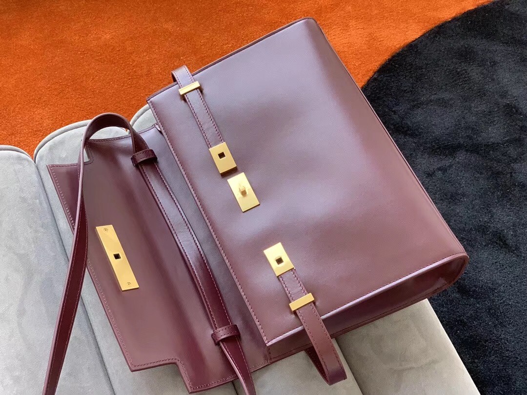 Sa**t Lau*nt manhattan baguette bag in bordeaux calfskin