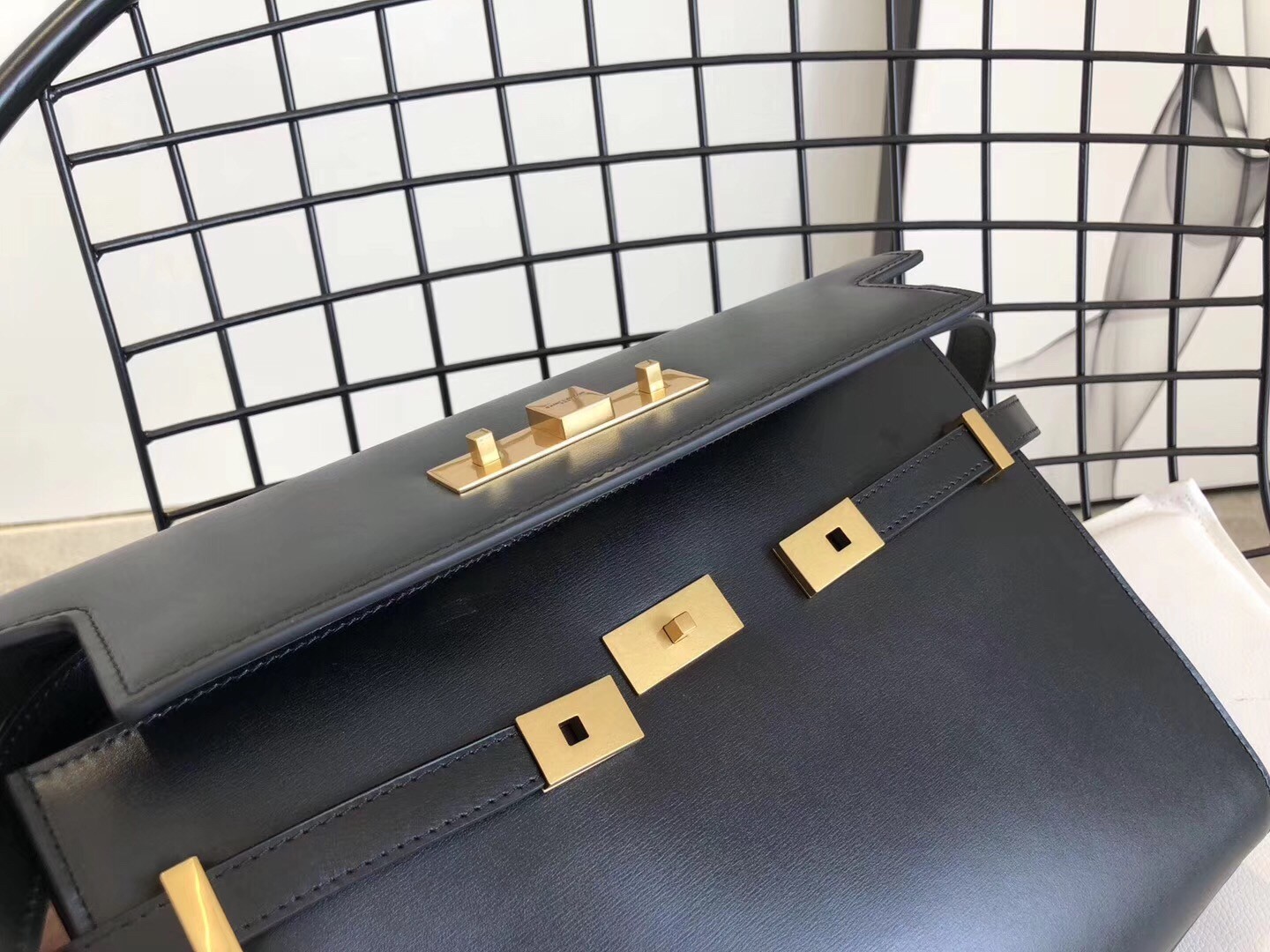 Sa**t Lau*nt manhattan baguette bag in black calfskin