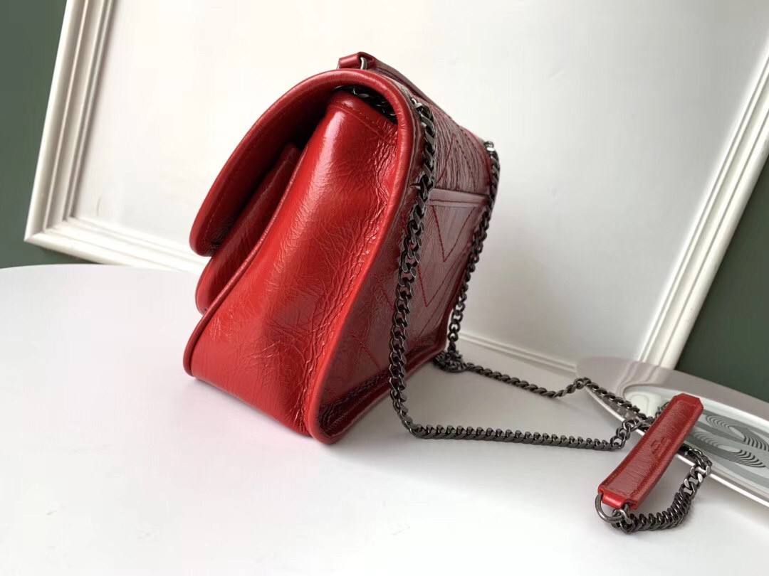 Sa**t Lau*nt baby niki chain bag in red crinkled leather