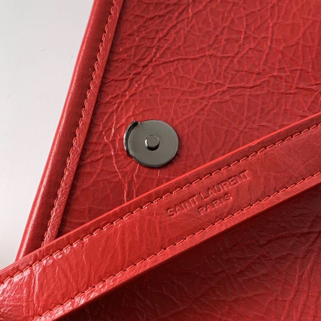 Sa**t Lau*nt baby niki chain bag in red crinkled leather