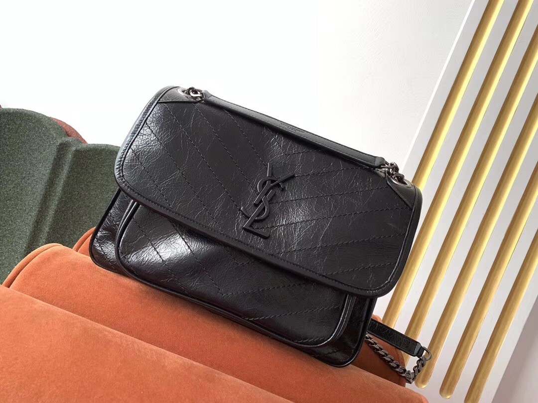 Sa**t Lau*nt medium niki bag in black crinkled leather