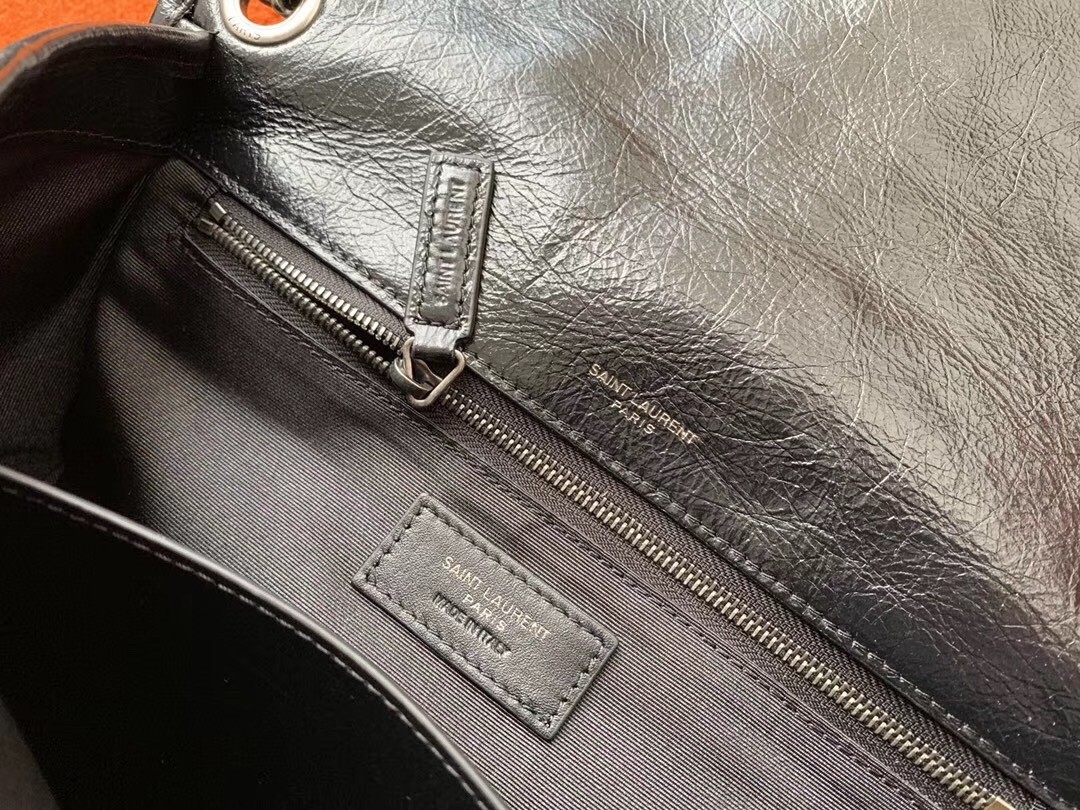 Sa**t Lau*nt medium niki bag in black crinkled leather